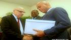 PHOTO: Haiti - Reginald Boulos presents Commission Report to President Michel Martelly
