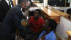 PHOTO: Haiti - Premier Minis Evans Paul visite fanmi Fantom Barikad Crew nan Rue Nicolas