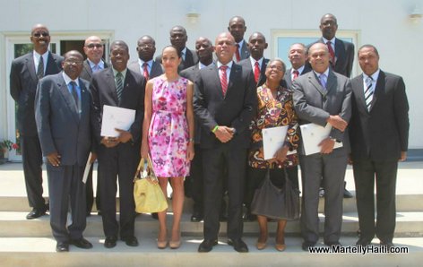 President Michel Martelly, les membres Conseil d'Administration d'Organes de Securite Sociale (CAOSS) et du Conseil Superieur des Salaire