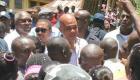 President Martelly a son arrivee a Plaisance en compagnie des ministres des Affaires Sociales, M. Charles Jean-Jacques et et de l'Interieur, M.David B