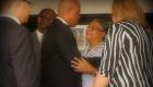 PHOTO: Haiti President Martelly visits Mirlande Manigat after death of husband Lesly Manigat